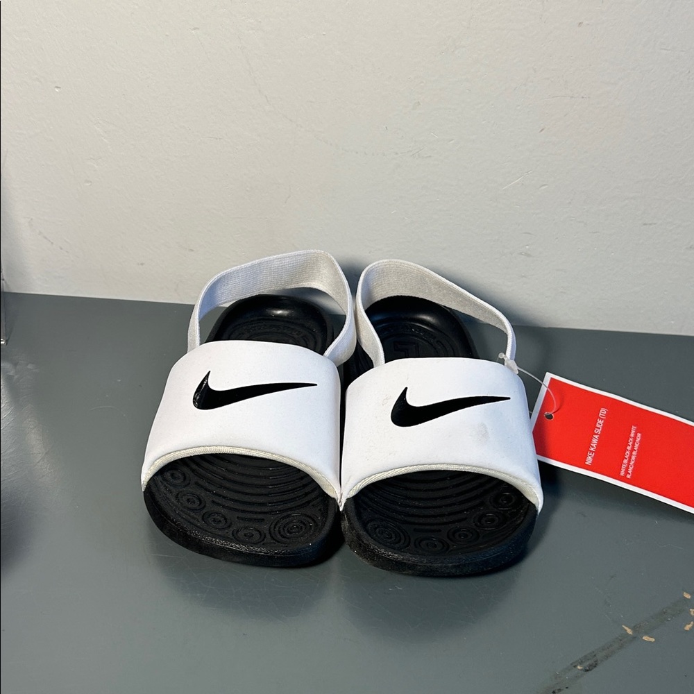 Nike, Size 7c baby Kawa Black and White Slide Sandals